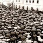 Citizens of Preveza, Epirus, waiting to hear Col. George Papadopoulos, leader of the junta, address them under the rain.